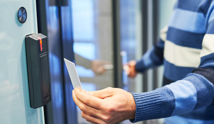 a person using a key card reader