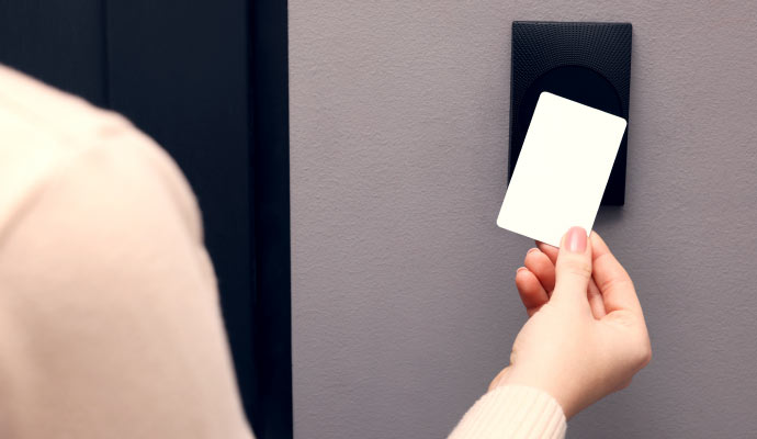person using key card reader
