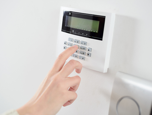 a modern security system featuring sensors and a control panel.
