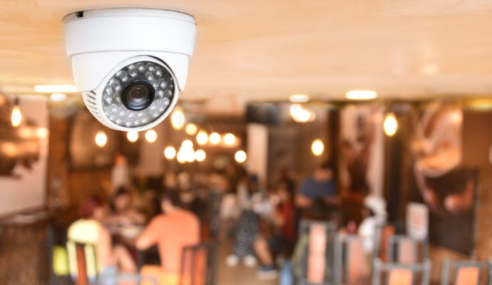 Security camera monitoring a restaurant interior