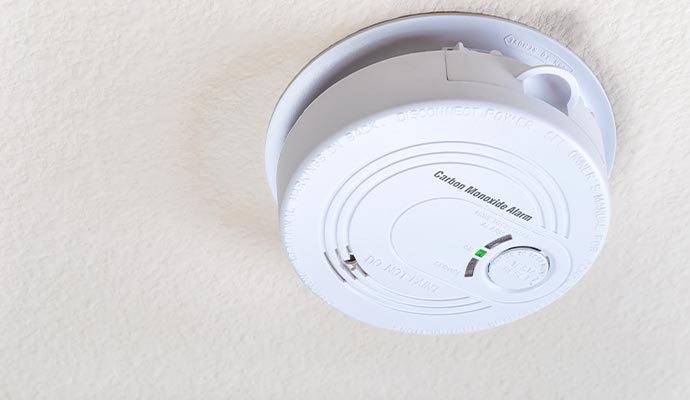 Carbon monoxide detector mounted on a wall for home safety