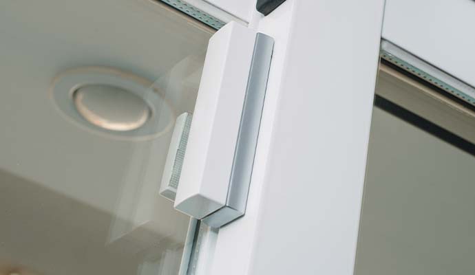 Glass break detector in a commercial building