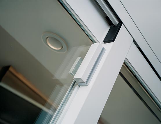 Glass break detector mounted on the door