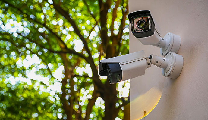 Outdoor home security cameras mounted on exterior wall Outdoor home security cameras mounted on exterior wall