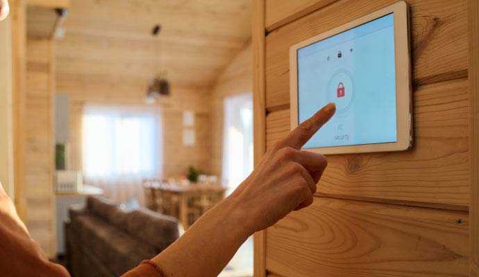 Person using interactive home security panel