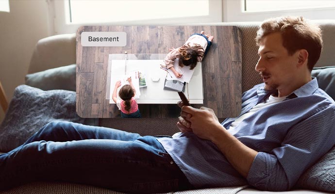 Person monitoring indoor camera footage