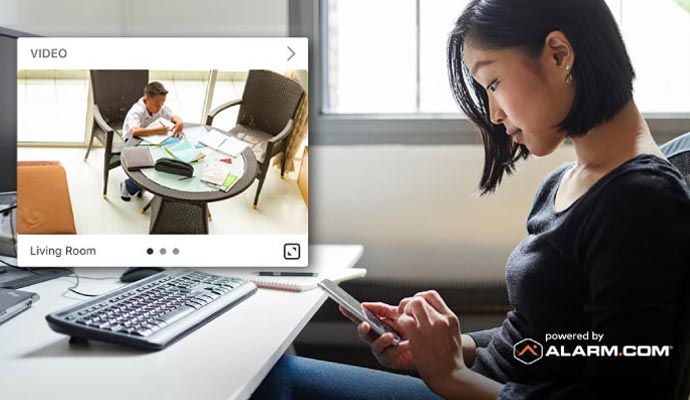 A person monitoring live feed in smartphone