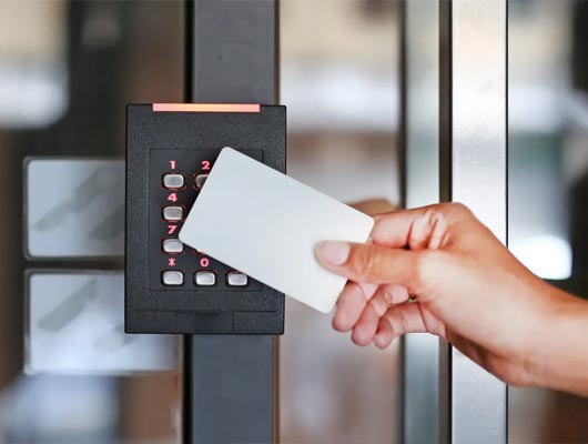 Person using key card scanner