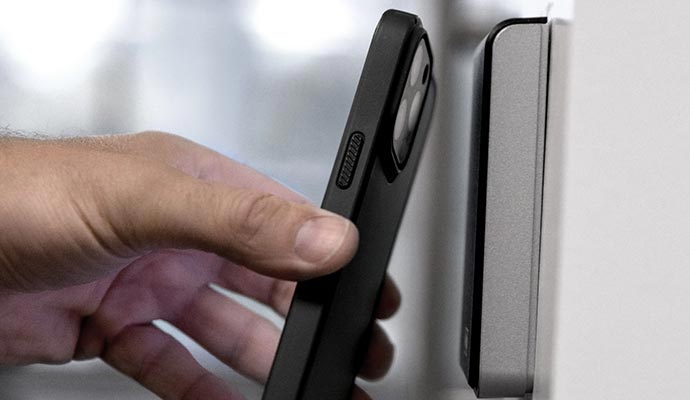 A person using Mercury control system with smartphone A person using Mercury control system with smartphone