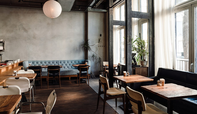 Restaurant interior with wooden tables