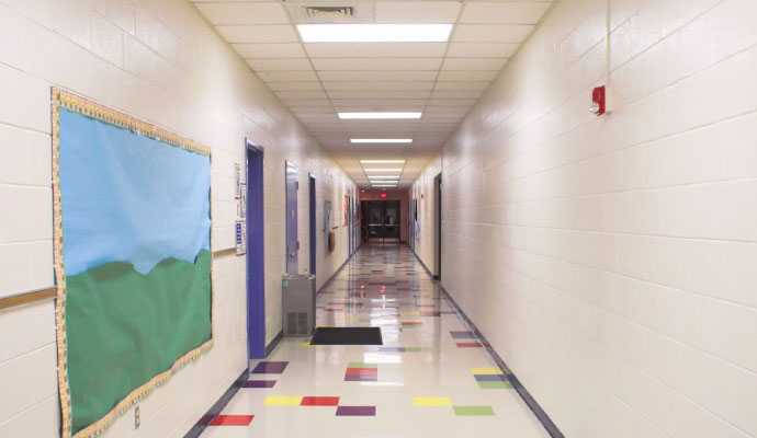 School hallway with fire alarm strobe