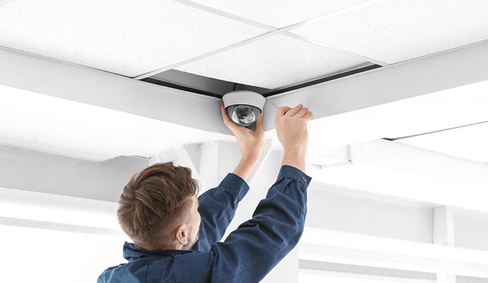 A person is installing a panoramic camera A person is installing a panoramic camera
