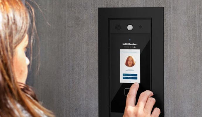 A person using LiftMaster access control system