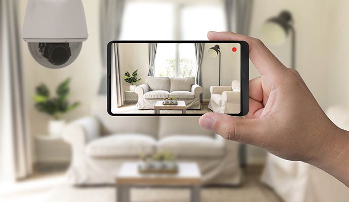 User seeing living room on mobile through security camera